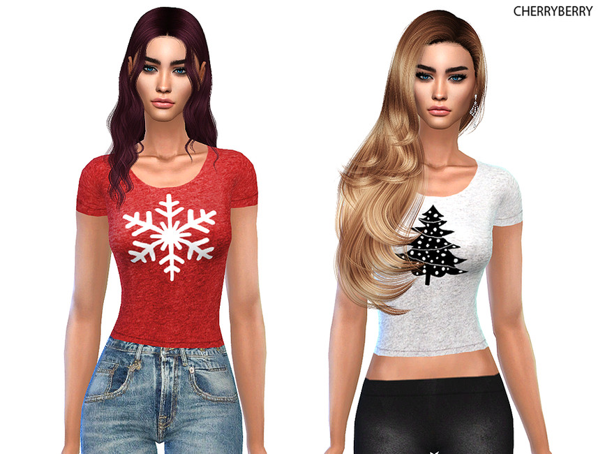 Zwei Sims tragen festliche Weihnachts-T-Shirts, eines mit einer Schneeflocke und eines mit einem Weihnachtsbaum