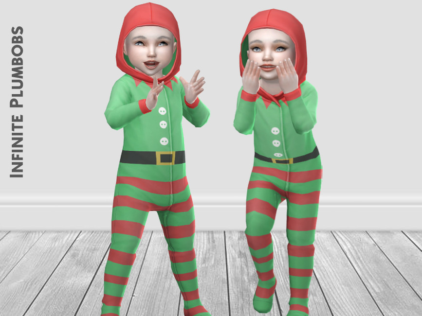 Zwei Kleinkinder in Die Sims 4, die einen Schlafanzug für Weihnachten tragen, bei dem ihr Kopf bedeckt ist und sie wie ein Elf aussehen.