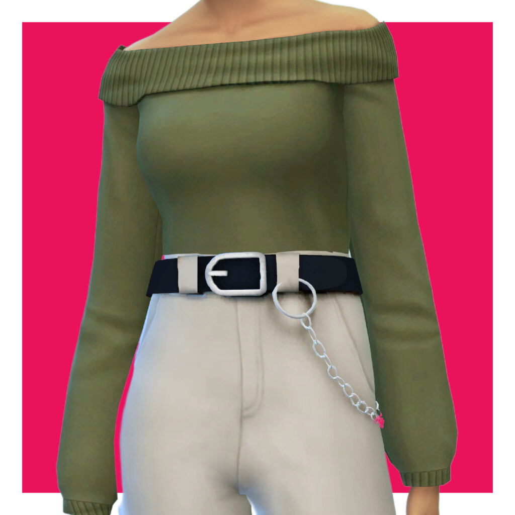 Eine Sim auf einem rosa Hintergrund trägt einen schulterfreien grünen Pullover mit einer hochtaillierten beigen Hose.