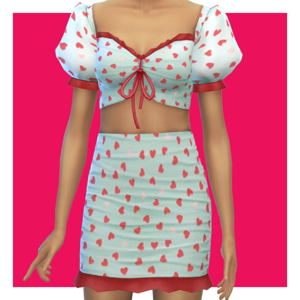 Eine Sim auf einem rosa Hintergrund, die ein zweiteiliges Set mit einem Crop-Top und einem Rock trägt, der mit Herzen bedeckt ist.