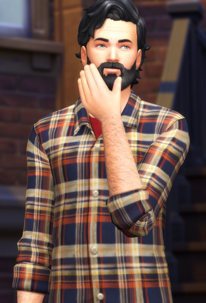 Ein männlicher Sim aus Die Sims 4, der ein orangefarbenes, blaues und gelbes Flanellhemd als seine Sims 4 CC Männerhemden trägt.
