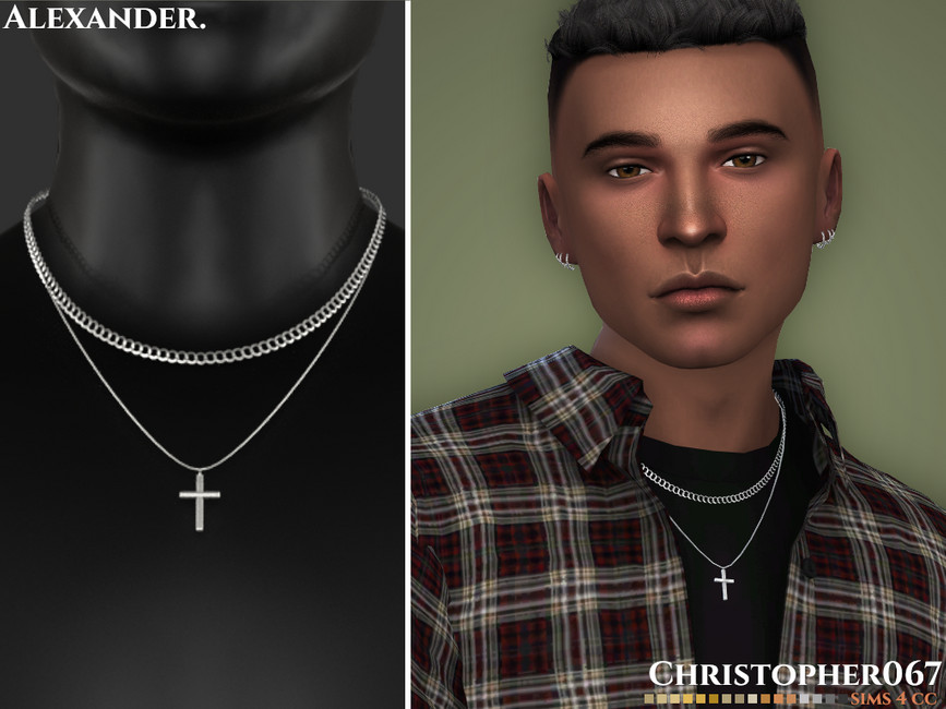 Ein männlicher Charakter aus Die Sims 4 mit kurzen braunen Haaren. Er trägt ein schwarzes T-Shirt mit einem karierten Hemd darüber und trägt eine CC-Halskette, die silber ist und mit einer Kette und einem Kreuz versehen ist.