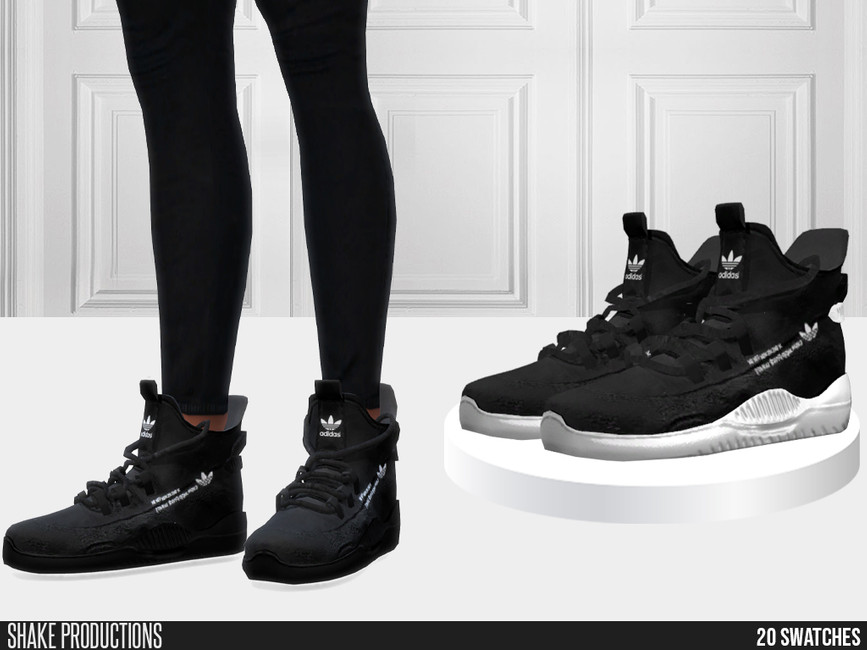 Ein Paar Beine mit hohen Adidas Sneakers