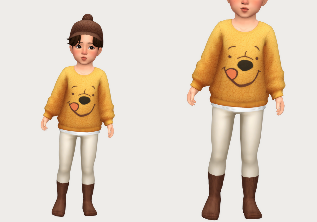 Ein Kleinkind in Die Sims 4 trägt eine Sims 4 CC-Kleidungsoption mit Winnie Puuh auf dem Pullover