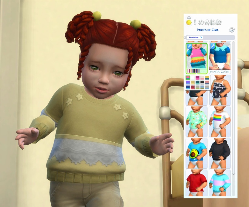Ein rothaariges Baby aus Die Sims 4, das einen gelben Pullover mit Spitze trägt.