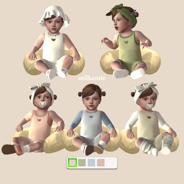 Fünf Kleinkinder aus Die Sims 4, die alle in einem Kissen sitzen und verschiedene Strampler tragen.